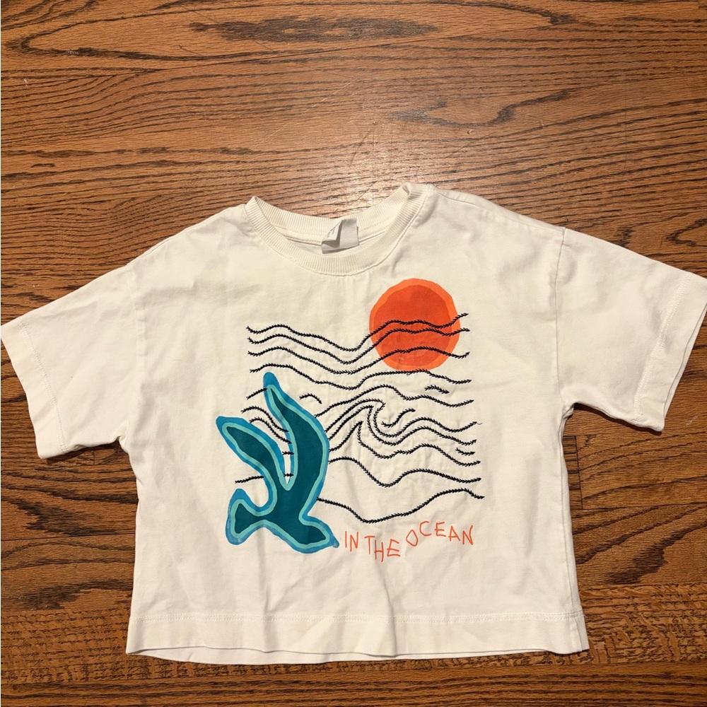 Zara White Tee with Teal Wave and Orange Sun Graphic
